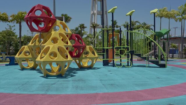 A Colorful Playground For Small Children In A City Park In Bright Sunny Weather. Family Outdoor Recreation.