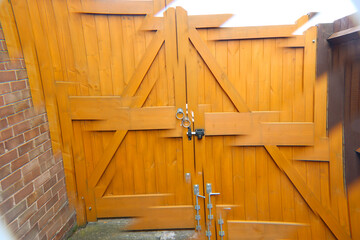 Double wooden house gates abstract