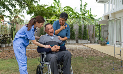 Nurse assisting senior man in wheelchair in a garden at home. The scene includes healthcare, compassion, assistance, and age diversity.