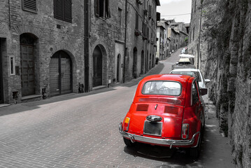 old red retro classic car on an Italian street