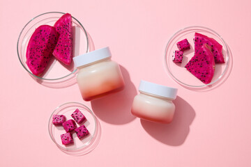 Slices of red dragon fruit placed inside glass petri dishes. Unbranded jars are featured for mockup. Vitamin A is another great vitamin found in Dragon fruit (Hylocereus)