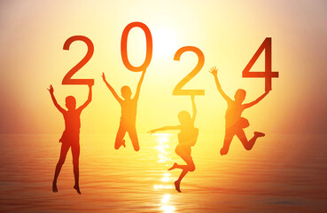 Happy new year card 2024. Silhouette of children girl is jumping on tropical beach with fantastic sunset sky background. Kids holding the number 2024 with sea and sunrise background. - Powered by Adobe