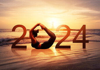 Happy new year card 2024. Silhouette of healthy girl doing Yoga Bow pose on tropical beach with...