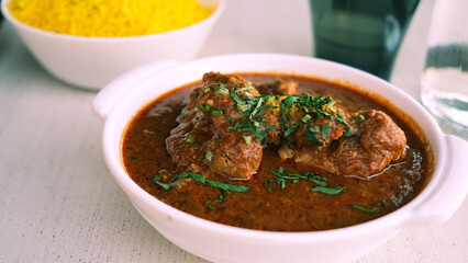 Chicken Kohlapuri is spicy Maharashtrian delicary of tender boneless chicken cooked with aromatic roasted ground spices and coconut. India food.