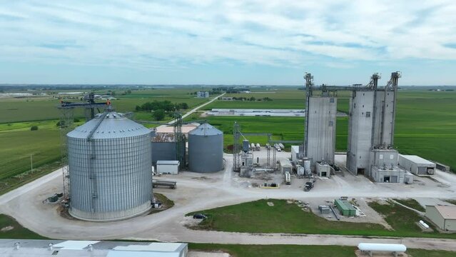 Grain elevator and ethanol plant in rural Midwest USA. Aerial truck shot during summer months.