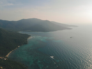 Aerial view of Karimunjawa Islands, Jepara, Indonesian archipelago, Volcano Island, coral reefs, white sand beaches. Top tourist destination, best diving snorkelling.