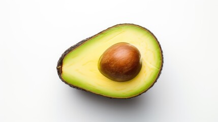 Half an avocado with a stone on a white background