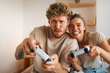 Young couple in love spending time together at home © Valerii Apetroaiei