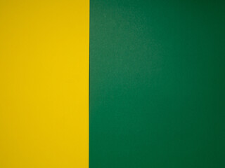 Yellow and green backdrop paper background. Top view