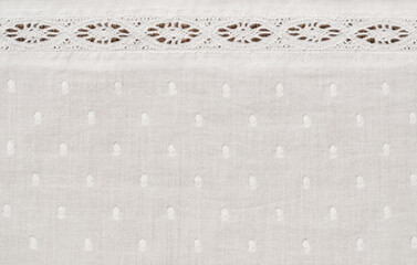 Texture of spotted fabric with a lace line - obrazy, fototapety, plakaty