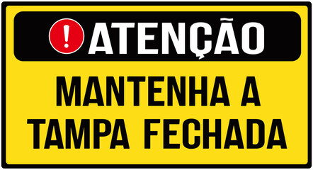 A sign that says in portuguese language : Attention, keep the lid closed