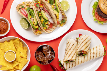 Mexican food featuring tacos, burritos, nachos, burgers