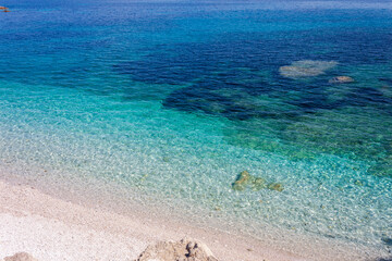 Obraz premium Capo Bianco beach, on the elba island, seen from the drone. Isola d'Elba, italy, a beautiful Island.