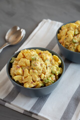 Homemade Classic Potato Salad in Bowls, side view.