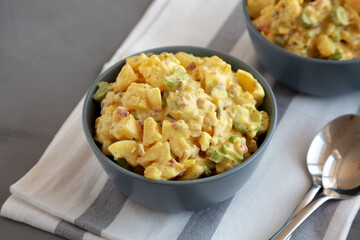 Homemade Classic Potato Salad in Bowls, side view.