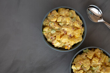 Homemade Classic Potato Salad in a Bowl, top view. Flat lay, overhead, from above. Copy space.