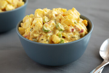 Homemade Classic Potato Salad in a Bowl, side view.