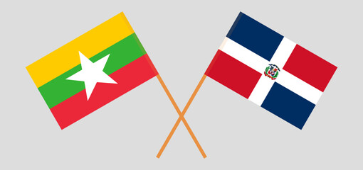 Crossed flags of Myanmar and Dominican Republic. Official colors. Correct proportion