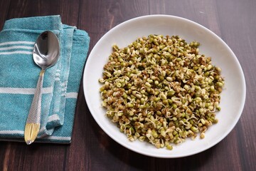 Sprouted moong beans. Protine rich salad. Healthy snack items. Sprouted Lentil Salad. Mixed with Onion, tomatoes, green chili and coriander. Copy space. Sprout Bhel.