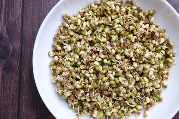 Sprouted moong beans. Protine rich salad. Healthy snack items. Sprouted Lentil Salad. Mixed with Onion, tomatoes, green chili and coriander. Copy space. Sprout Bhel.