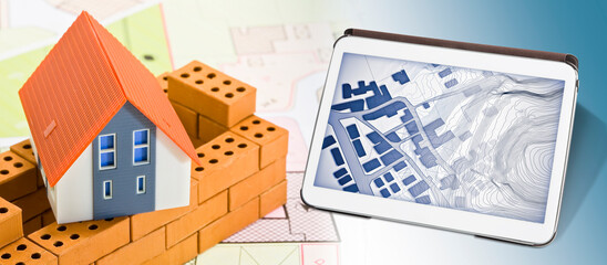 Buildings Permit concept with imaginary cadastral on digital tablet - building activity and...