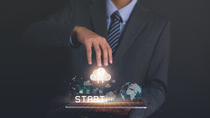 Businessman holding on tablet. Startup concept with icon business and network connection on modern virtual interface from digital tablet.