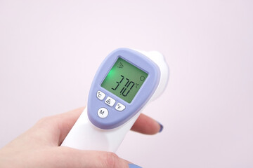 Non-contact digital medical infrared forehead thermometer for temperature measurement.