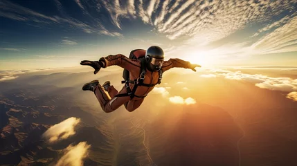 Poster Im Rahmen A Parachutist in free fall at the sunset extream sport lifestyle with beautiful sky cloud sunset background © VERTEX SPACE