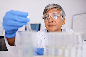 Essential oil, mature or scientist in lab to research organic or natural fragrance for science development. Serum sample, treatment or collagen expert working on a skincare, perfume or beauty product