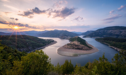 Panoramic sunset view with one of most picturesque meander of Arda river near Kardzhali, Rodopi Mountains in Bulgaria