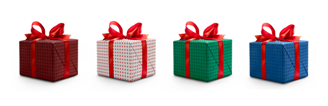 A collection of red, blue  and green gift wrapped Christmas, birthday or valentines presents with red ribbon bows isolated against a transparent background.