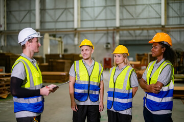 Group of smiling worker standing together at logistic distribution warehouse, Teamwork concept