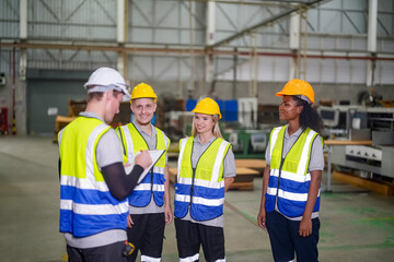 Group of smiling worker standing together at logistic distribution warehouse, Teamwork concept