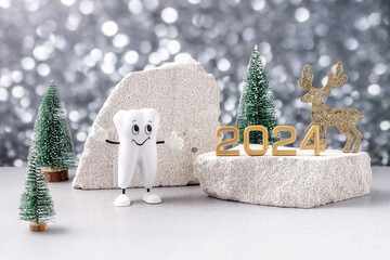 cartoon model of a tooth, the numbers 2024 and a Christmas deer on a podium made of stone and...