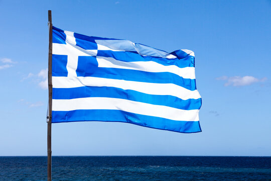 Greek flag waving in mid air