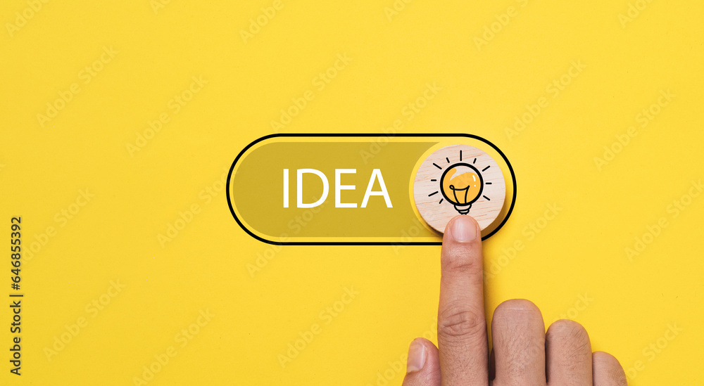 Poster hand touching to toggle button with glowing lightbulb icon to open idea status for creative thinking