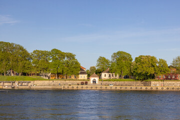 Obraz premium Old building at the outlet of the river Glomma in Fredrikstad, Norway 