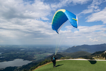 Schwangau, Germany - August 12, 2023: Paragliding over Neuschwanstein Castle in Germany