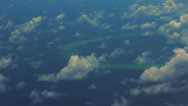 Seaplane flies over Maldives island - 4K Video