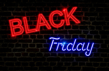 Night image of the text Black Friday in red and blue neon, on a brick wall. Concept of the sales event.