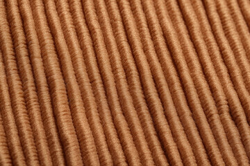 Vintage Versatility: A Close-up of Warm and Textured Corduroy Fabric, Showcasing Rich Ribbed Patterns, Perfect for Fashion Designers and the Fashion Industry, Ideal for Autumn and Winter Styles.