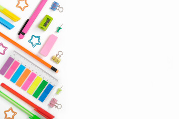 Creative layout made of neon colorful stationery set on white background. Space for your text