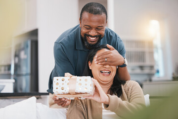 Birthday gift surprise, cover eyes and couple smile, woman and black man giving package for love,...