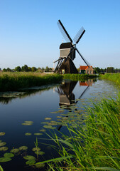 Traditional Dutch windmill on a sunny summer day