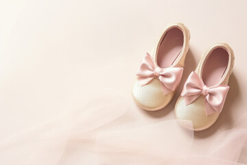 Cute little baby shoes of new born on empty background for baby shower invitation with space for text