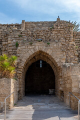 Fototapeta na wymiar Arched entrance into Caesarea National Park in Caesarea, Israel. 