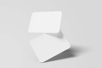 Two floating business cards that look elegant on a white background
