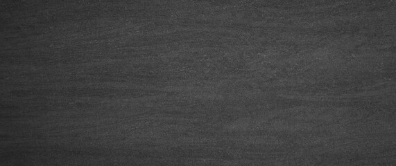 Black, dark and gray abstract cement wall background.chalkboard background