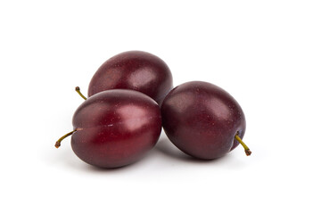 Fresh plums, isolated on white background.