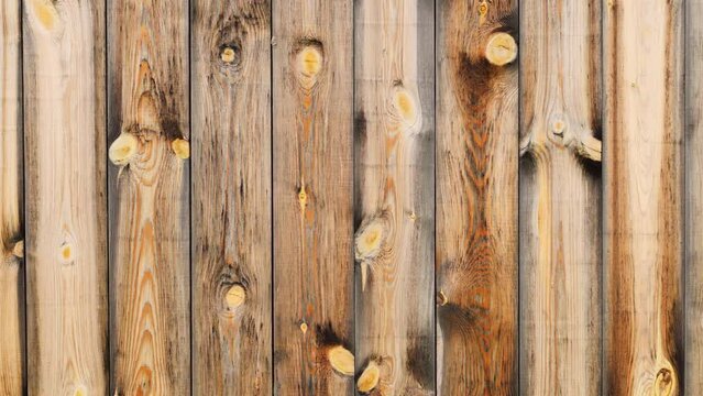 Wooden fence. Aged wood texture. Wooden background.